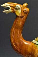 A LARGE TANG DYNASTY SANCAI-GLAZED POTTERY CAMEL