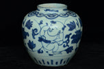 A LATE MING DYNASTY BLUE AND WHITE BOYS JAR