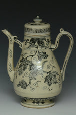 AN EARLY MING DYNASTY BLUE AND WHITE WINE EWER EX. CHRISTIE'S 2009