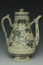 AN EARLY MING DYNASTY BLUE AND WHITE WINE EWER EX. CHRISTIE'S 2009