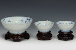 THREE DRAGON CUPS YONGZHENG MARK AND PERIOD AND STAND EX. SOTHEBY'S