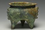 A WESTERN ZHOU DYNASTY ARCHAIC BRONZE RITUAL FOOD VESSEL LI