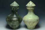 TWO LARGE HAN DYNASTY GREEN GLAZED HU VASES AND COVERS