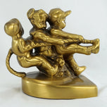 SINGLE BOOKEND TUG OF WAR PM CRAFTSMAN 1953, 1950S, UNITED STATES, BRASS FINISH