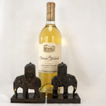 PAIR OF RONSON HOWDAH ELEPHANT BOOKENDS 1923, 1920S, UNITED STATES, FELT