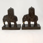 PAIR OF RONSON HOWDAH ELEPHANT BOOKENDS 1923, 1920S, UNITED STATES, FELT