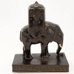 PAIR OF RONSON HOWDAH ELEPHANT BOOKENDS 1923, 1920S, UNITED STATES, FELT
