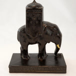 PAIR OF RONSON HOWDAH ELEPHANT BOOKENDS 1923, 1920S, UNITED STATES, FELT