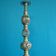 THREE VINTAGE ORNATE INDIAN CAST BRASS FLOOR-STANDING CANDLE PILLARS/STANDS, 1970S