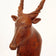 SINGLE LARGE VINTAGE AFRICAN HANDCARVED ANTELOPE WOOD BOOKEND, 1990S, CENTRAL AFRICAN REPUBLIC