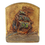 SINGLE SHIP AT SUNRISE BOOKEND LITTCO BRONZED CAST IRON POLYCHROME CIRCA 1925, 1920S, UNITED STATES