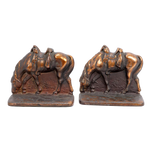 PAIR OF CAST IRON RIDERLESS IRON HORSE BOOKENDS COPPER PATINA CIRCA 1930, 1930S, UNITED STATES