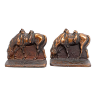 PAIR OF CAST IRON RIDERLESS IRON HORSE BOOKENDS COPPER PATINA CIRCA 1930, 1930S, UNITED STATES