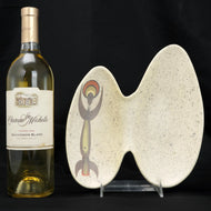 MID-CENTURY MARC BELLAIRE (1925 – 1994) ABSTRACT TRIBAL BOOMERANG SERVING DISH, 1950S, UNITED STATES, CERAMIC