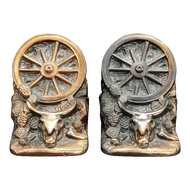 1930S DODGE WAGON WHEEL WESTERN BOOKENDS - A PAIR, UNITED STATES, COPPER FINISH
