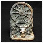 1930S DODGE WAGON WHEEL WESTERN BOOKENDS - A PAIR, UNITED STATES, COPPER FINISH