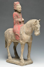 A CHINESE TANG DYNASTY PAINTED POTTERY HORSE AND RIDER