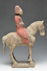 A CHINESE TANG DYNASTY PAINTED POTTERY HORSE AND RIDER