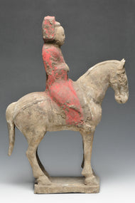 A CHINESE TANG DYNASTY PAINTED POTTERY HORSE AND RIDER