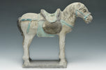 A CHINESE MING DYNASTY PAINTED POTTERY HORSE