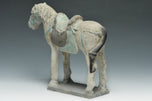 A CHINESE MING DYNASTY PAINTED POTTERY HORSE