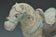 A CHINESE MING DYNASTY PAINTED POTTERY HORSE