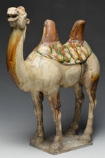 A TANG DYNASTY SANCAI-GLAZED POTTERY CAMEL WITH OXFORD TL TEST