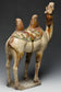 A TANG DYNASTY SANCAI-GLAZED POTTERY CAMEL WITH OXFORD TL TEST