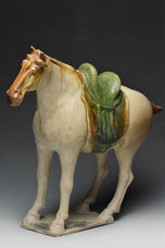 A TANG DYNASTY SANCAI-GLAZED POTTERY HORSE WITH OXFORD TL TEST