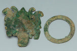 A PAIR OF HAN DYNASTY GILT BRONZE MASK RING HANDLES