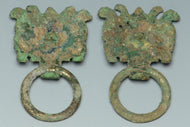 A PAIR OF HAN DYNASTY GILT BRONZE MASK RING HANDLES
