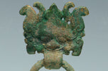 A PAIR OF HAN DYNASTY GILT BRONZE MASK RING HANDLES