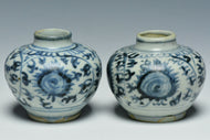 A PAIR OF EARLY MING DYNASTY BLUE AND WHITE JARS