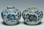 A PAIR OF EARLY MING DYNASTY BLUE AND WHITE JARS