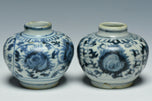 A PAIR OF EARLY MING DYNASTY BLUE AND WHITE JARS