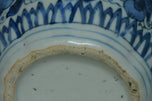 A LATE MING DYNASTY BLUE AND WHITE JAR