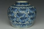 A LATE MING DYNASTY BLUE AND WHITE JAR