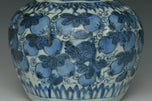 A LATE MING DYNASTY BLUE AND WHITE JAR