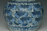 A LATE MING DYNASTY BLUE AND WHITE JAR