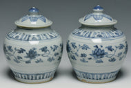 A PAIR OF MING DYNASTY BLUE AND WHITE JARS 16TH CENTURY