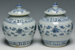 A PAIR OF MING DYNASTY BLUE AND WHITE JARS 16TH CENTURY