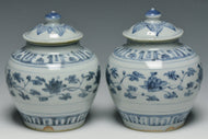 A PAIR OF MING DYNASTY BLUE AND WHITE JARS 16TH CENTURY
