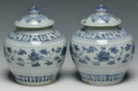 A PAIR OF MING DYNASTY BLUE AND WHITE JARS 16TH CENTURY