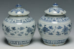 A PAIR OF MING DYNASTY BLUE AND WHITE JARS 16TH CENTURY