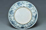 A MING DYNASTY BLUE AND WHITE FIGURAL DISH 16TH CENTURY