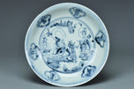 A MING DYNASTY BLUE AND WHITE FIGURAL DISH 16TH CENTURY
