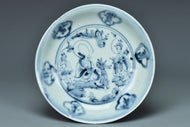 A MING DYNASTY BLUE AND WHITE FIGURAL DISH 16TH CENTURY