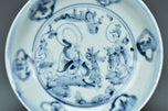 A MING DYNASTY BLUE AND WHITE FIGURAL DISH 16TH CENTURY