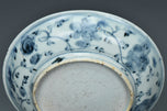 A MING DYNASTY BLUE AND WHITE FIGURAL DISH 16TH CENTURY