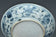 A MING DYNASTY BLUE AND WHITE FIGURAL DISH 16TH CENTURY